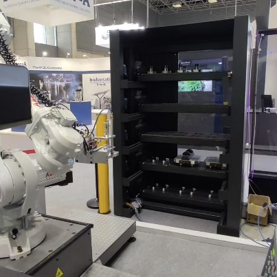 RP System with integrated robotic arm